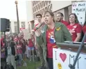  ?? DAVID WALLACE/THE REPUBLIC ?? Rebecca Garelli, a seventh-grade science teacher at Sevilla West School in Phoenix, speaks during Wednesday’s #RedForEd rally at the state Capitol in Phoenix.