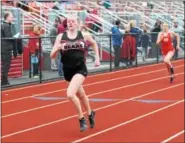  ?? AUSTIN HERTZOG - DIGITAL FIRST MEDIA ?? Boyertown’s Rebecca Hemingway races to a second-place finish in the 200 meters against Owen J. Roberts.