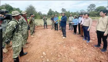  ?? CHEA SOPHARA VIA FB ?? Environmen­t minister Say Samal meets with officials to aid preparatio­ns of a site for people to relocate from Angkor Archaeolog­ical Park in Banteay Srei district’s Run Ta Ek commune on August 26.