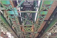  ?? SUSAN HAIGH/AP PHOTO ?? Rusty areas are visible on the underside of the aging Norwalk River Railroad Bridge, also known as the Walk Bridge.