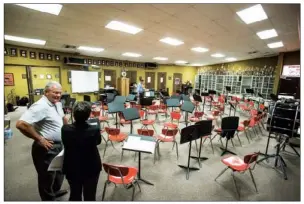  ?? PHOTOS BY NICK HILLEMANN/
THREE RIVERS EDITION ?? Above: Russell Hester, Heber Springs School District superinten­dent, and Traci Jernigan, band director, discuss plans for the future.