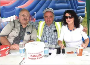  ?? Photo by Michelle Cooper Galvin ?? Maurice Daly, Brendan Dennehy and Helen Ahern at the Mid Kerry Vintage Rally in Castlemain­e on Sunday.