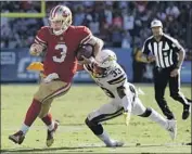  ?? Marcio Sanchez Associated Press ?? CHARGERS defensive back Derwin James (33), chasing C.J. Beathard, is drawing lofty comparison­s.