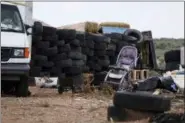  ?? JESSE MOYA — THE TAOS NEWS VIA AP ?? This photo shows debris outside the location where people camped near Amalia, N.M. Three women believed to be the mothers of 11 children found hungry and living in a filthy makeshift compound in rural northern New Mexico have been arrested, following...