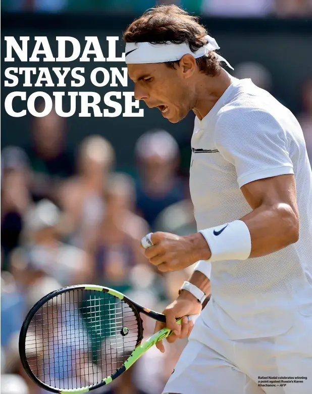  ?? AFP ?? Rafael Nadal celebrates winning a point against Russia’s Karen Khachanov. —