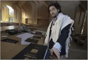  ?? ROBERT BUMSTED — THE ASSOCIATED PRESS ?? Rabbi Joshua Franklin stands inside the sanctuary at the Jewish Center of the Hamptons in East Hampton, New York.