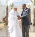  ??  ?? President Kenyatta with Sultan ul-Bohra Dr. Mufaddal Saifuddin in the central courtyard of the campus.
