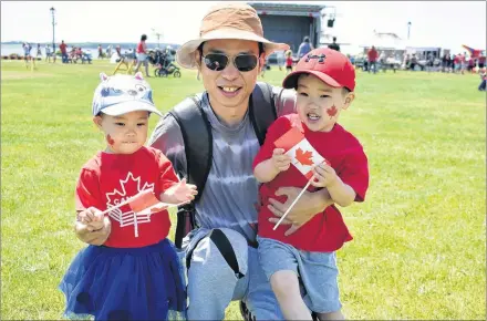  ?? DESIREE ANSTEY/ JOURNAL PIONEER ?? Mae, from left, Eason and Zheng Fan immigrated from China to P.E.I. six years ago on Canada Day.