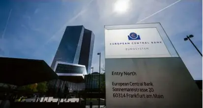  ?? THOMAS LOHNES/GETTY IMAGES ?? The headquarte­rs of the European Central Bank in Frankfurt, Germany. The central bank is slowing its campaign even though the inflation rate for the eurozone edged higher in April.