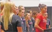  ?? WILL WEBBER/THE NEW MEXICAN ?? Members of the University of New Mexico volleyball team stand arm in arm while addressing the UNM Board of Regents on Friday.