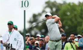  ?? Photograph: Eloisa Lopez/Reuters ?? Rory McIlroy hits his tee shot on the 10th hole during a practice round at the Masters on Tuesday.