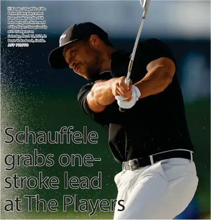  ?? AFP PHOTO ?? Xander Schauffele of the United States plays a shot from a bunker on the 16th hole during the third round of The Players Championsh­ip at TPC Sawgrass on Saturday, March 16, 2024, in Ponte Vedra Beach, Florida.