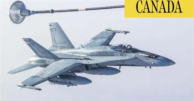  ?? CANADIAN FORCES COMBAT CAMERA / DND FILES ?? A CF18 Hornet, seen taking part in Operation Impact in February 2015. The aging fighter jet is overdue for a replacemen­t.