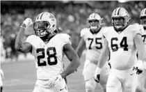  ?? CHARLES REX ARBOGAST/AP ?? Saints running back Latavius Murray (28), a UCF alum, is among the 16 Knights on NFL rosters to kick off the 2020 season.