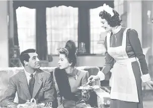  ??  ?? Cary Grant, Joan Fontaine and Heather Angel in Suspicion