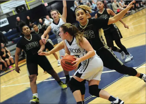  ?? Photo by Ernest A. Brown ?? Burrillvil­le senior wing Alyssa Simpson
(40) made big plays in the final 30 seconds to help the Broncos stay unbeaten with a 40-35 win over Davies Tech.