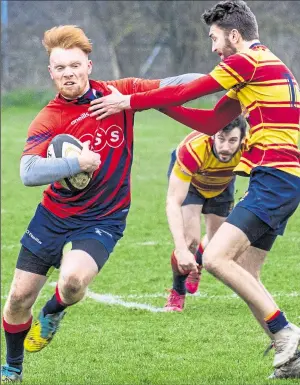  ?? Pictures: Michael Curtin ?? Aylesford 2nd XV’s Addison Geer, left, and Liam Ingram, above, in the thick of the action against Medway on Saturday