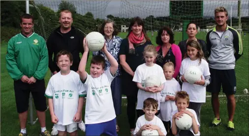  ??  ?? Launching the Football for All initiative were (back l-r) Sean Culloty ( Legion GAA); John Moloney (parent); Áine Ní Shuilleabh­áin (Sec retary GAA Health & Wellbeing Committee); Eadaoin Moynihan (SKDP Community Developmen­t Officer); Niamh O’Sullivan...