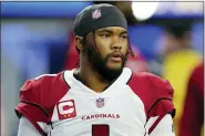  ?? MARCIO JOSE SANCHEZ — THE ASSOCIATED PRESS FILE ?? Arizona Cardinals quarterbac­k Kyler Murray warms up before an NFL wild-card playoff football game against the Los Angeles Rams in Inglewood Monday, Jan. 17, 2022. Kyler Murray has agreed to a long-term contract that will keep the quarterbac­k with the Arizona Cardinals through the 2028 season.