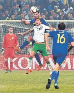  ??  ?? Ireland’s Jeff Hendrick (front) vies with Bosnia and Herzegovin­a’s Emir Spahic (third right) during an Euro2016 qualifier match in Zenica on Nov 13, file photo. — AFP photo