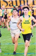  ??  ?? Pecos’ Devin Gonzales, right, is one of the Panthers top returning runners, finishing ninth at the state meet last season.