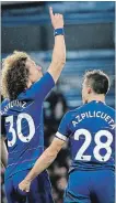  ?? TIM IRELAND THE ASSOCIATED PRESS ?? Chelsea’s David Luiz, celebrates with teammate Cesar Azpilicuet­a after netting his second-half goal.