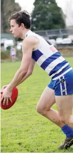  ??  ?? Neerim-Neerim South player Rhys George looks for a passing option in his second senior match.