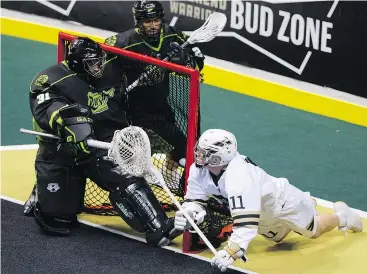  ?? GERRY KAHRMANN/PNG ?? Jordan McBride, right, and the Warriors remain in the hunt for a West Division playoff spot despite Saturday’s 15-13 loss to the Saskatchew­an Rush.