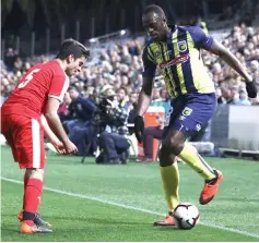  ?? — AFP photo ?? File photo shows Usain Bolt (right), playing for A-League football club Central Coast Mariner.