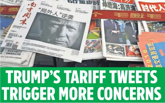  ?? NG HAN GUAN, AP ?? Donald Trump is hot news in China, which he has repeatedly criticized as having trade policies that hurt the U. S. economy. A new series of tweets Sunday threatenin­g a 35% tariff on U. S. companies shipping jobs abroad has leftmany trade experts baffled.