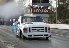  ??  ?? Rawlings Barnes debuted his 2WD Rudy’s drag truck by making some exhibition passes over the weekend and breaking into the 5s with a 5.998-second 1/8-mile pass, which makes it the quickest 6.4L Power Stroke truck that we know of.