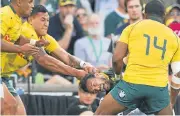  ?? /Dirk Kotze/Gallo Images ?? Crystal clear: Australia’s Israel Folau tugs at Dillyn Leyds’ hair during the Test in Bloemfonte­in on Saturday.