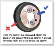  ??  ?? Once the screws are removed, strike the drum in the area of the blue arrow; it should never be hit in the area of the red arrow.