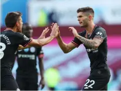  ?? (Reuters) ?? Christian Pulisic celebrates scoring Chelsea's equaliser