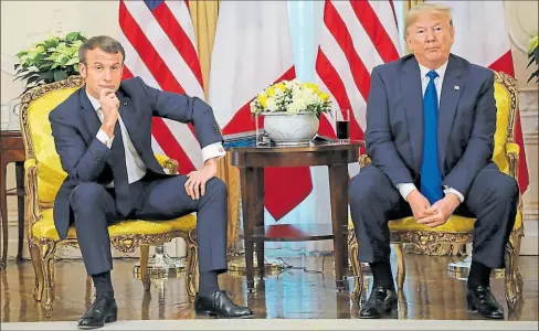  ?? Ludovic MARIN/AFP ?? •
El incómodo encuentro entre el presidente francés, Emmanuel Macron, y de EE.UU., Donald Trump, en Londres.