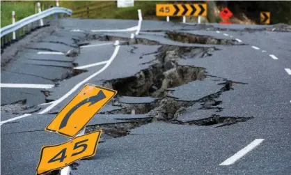  ?? Photograph: Marty Melville/AFP/Getty Images ?? Earthquake damage to State Highway 1 is seen south of Kaikoura in 2016.