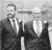  ?? LEON NEAL/GETTY-AFP 2016 ?? Media mogul Rupert Murdoch, seen with son Lachlan, is planning two news services in Britain that will borrow from what worked at Fox News.