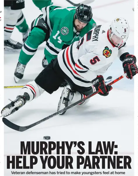  ?? BRANDON WADE/AP ?? Hawks defenseman Connor Murphy has taken on more of a mentorship role this season.