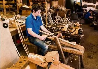  ??  ?? After the chesnut is split, the pieces are dried and shaved by hand on the shaving-horse