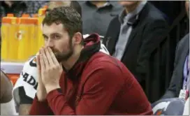  ?? JIM MONE — ASSOCIATED PRESS FILE ?? Cleveland’s Kevin Love watches from the bench in Minneapoli­s. Love disclosed in an essay for the Players’ Tribune that he suffered a panic attack on Nov. 5 in a home game against the Atlanta Hawks.