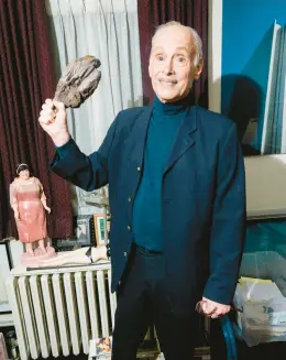  ?? SINNA NASSERI/THE NEW YORK TIMES ?? John Waters holds the rubber leg of lamb that Kathleen Turner used as a murder weapon in his movie “Serial Mom” on May 25 at his home in Baltimore.
