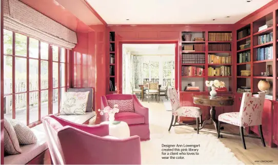  ?? ANN LOWENGART ?? Designer Ann Lowengart created this pink library for a client who loves to wear the color.