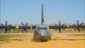  ?? U.S. AIR FORCE PHOTO/SENIOR AIRMAN HARRY BREXEL ?? A Royal Canadian Air Force C-130J taxis to a parking spot in order to offload cargo during GREEN FLAG 16-04 on Feb. 17 at the Geronimo Landing Zone at Fort Polk, La. Approximat­ely 50 Canadians and two of their C-130Js participat­ed in the large-scale, joint air mobility exercise.