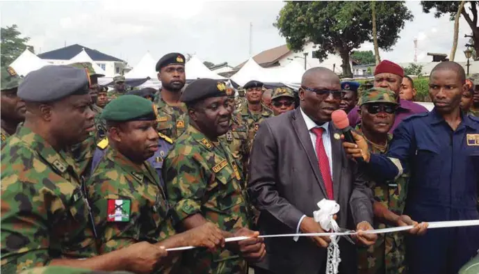  ??  ?? L-R: Air Vice Marshal Remigius Ekeh, Major General Enobong Udoh, Rear Admiral Sylvanus Abbah, Lagos Commission­er for Special Duties, Mr. Seye Oladejo and Air Vice Marshal, Olusoji Awomoju, during the inaugurati­on of 20 patrol and communicat­ions...