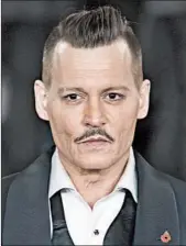  ?? VIANNEY LE CAER/AP ?? A man allegedly punched by Johnny Depp, above, says he was fired when he refused to promise not to sue.