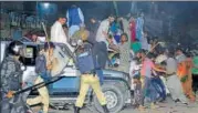  ?? AP ?? ▪ Police use force to disperse supporters of Nawaz Sharif, who had gathered to see him in Lahore on Friday.