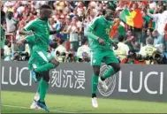  ?? REUTERS ?? Senegal’s Idrissa Gueye (left) and goalscorer M’Baye Niang are all smiles after Tuesday’s 2-1 victory over Poland in Moscow.