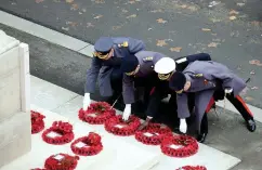  ?? ?? Tributes... Senior members of the armed forces lay their wreaths. Ranks of war veterans, above, march in London’s Whitehall yesterday morning