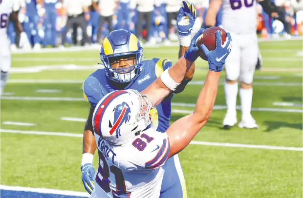  ?? Mark Kon ezny / USA TODAY Sports ?? Buffalo Bills tight end Tyler Kroft catches the winning touchdown late in the fourth quarter at Bills Stadium.