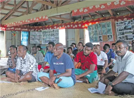  ??  ?? Villagers of Navai listening during the programme. Photo: Parliament of Fiji